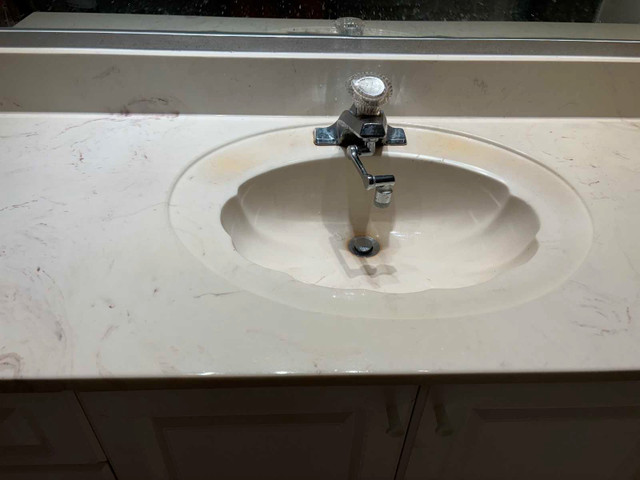 washroom vanity cabinet with sink and faucet
