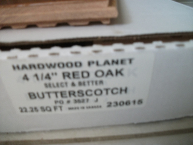 Red oak hardwood floor new in the box never open 4 .1/4only 1 b