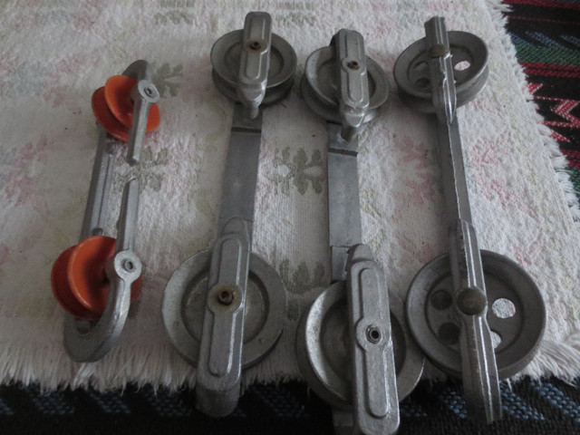 Vintage Clothesline elevator, 4 pulley separators and 1 reel